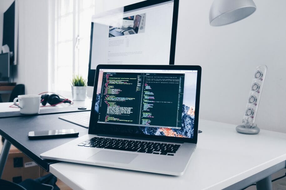 Laptop with code displaying