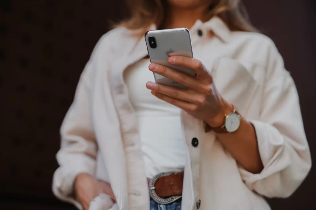 woman holding phone