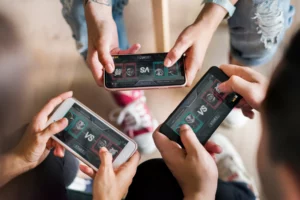 Mobile gamers playing together